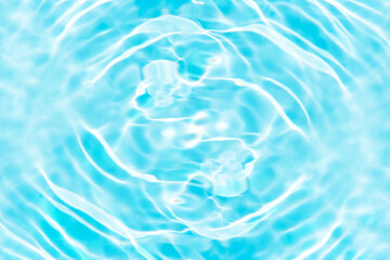 Blue water with ripples on the surface. Defocus blurred transparent blue colored clear calm water...