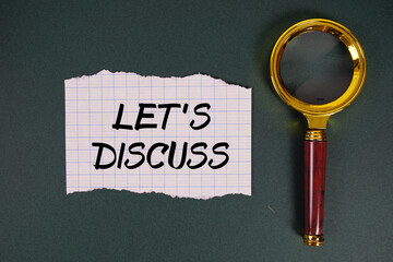 Let's Discuss text written on paper with magnifying glass