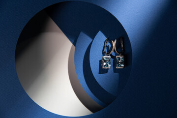 Close-up of jewelry on colored paper