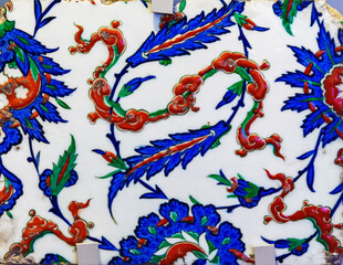Colorful floral Iznik ceramic tile with traditional Ottoman motif at Iznik Museum in Bursa, Turkey