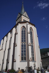 The Radstadt Parish Church stands alongside the northern city wall in the town of Radstadt in the...