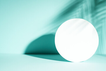 Art abstract background with podium and palm shadows.