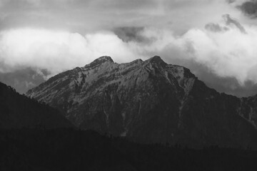Monochrome Mountain Silhouette with Clouds