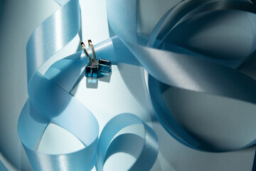 Close-up of jewelry on colored paper