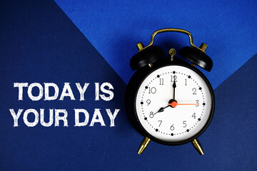Today is Your Day text with alarm clock on blue background