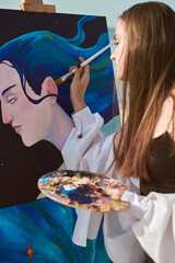 Young female artist paints vibrant canvas by seashore, capturing essence of creativity and...