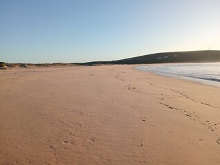 footprints on the beach
