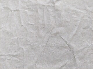 Crumpled white recycled craft paper texture with detailed surface. Cream paper. Crumpled white...