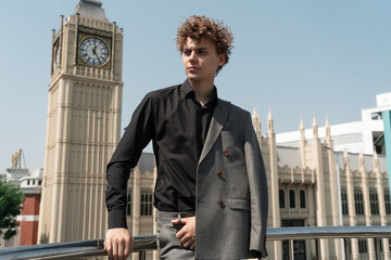 man in classic suit in the garden on the street