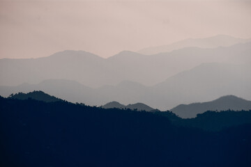 Layered Mountain Silhouettes