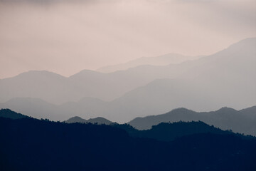Layered Mountain Silhouettes