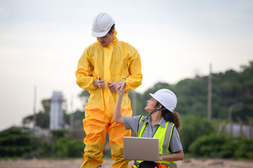 Water Pollution Control, Scientists at Work in the Field, Environmental Scientists Collecting Water...