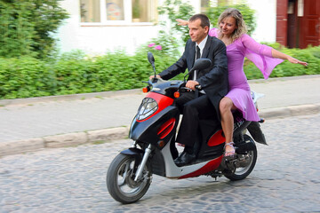 Love couple on scooter