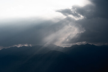 Sun Rays Breaking Through Clouds at Dusk