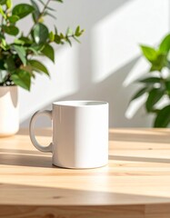 White mug on table with green plants nearby.