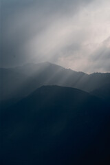 Sun Rays Breaking Through Clouds at Dusk