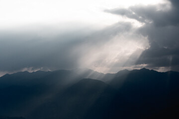 Sun Rays Breaking Through Clouds at Dusk