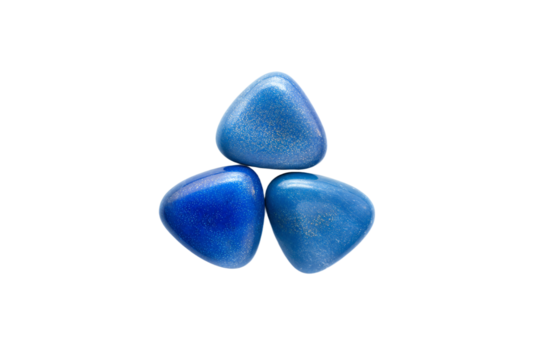 three blue triangular shaped stones on a white surface