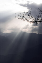 Sun Rays Breaking Through Clouds at Dusk