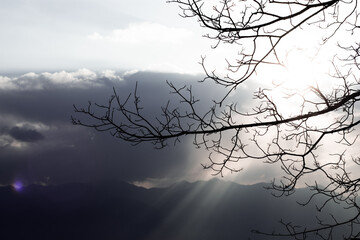 Sun Rays Breaking Through Clouds at Dusk