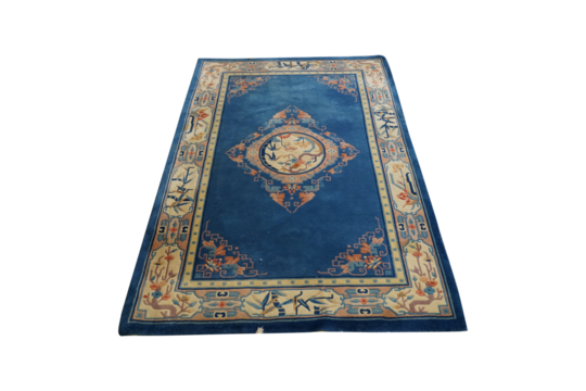 old book isolated on white The islamic prayer rug in blue and gold