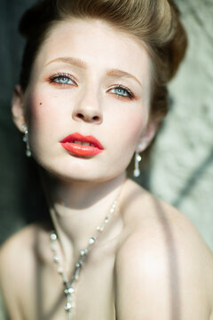 Fototapeta An Elegant Portrait Featuring a Model with Stunning Makeup and Beautiful Jewelry Accents