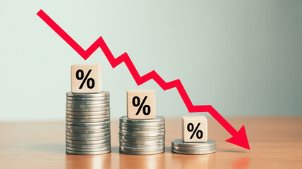 Red arrow graph shows declining percentages on coin stacks