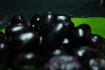 water drop on hand : A crystal-clear water drop resting on a hand symbolizes purity, life, freshness, and the delicate balance of nature and humanity