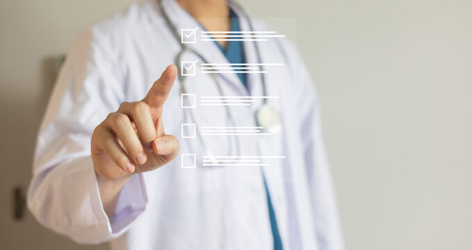 close up young general practitioner hand check mark box on medical checklist or opd record to read and diagnose and assess about patient's symptom for healthy and lifestyle concept