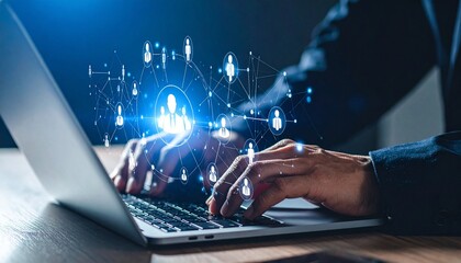 Person typing on a laptop with a digital network overlay, representing connection.