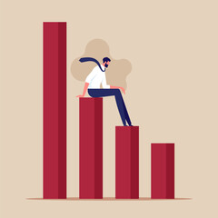 Economic recession or investment failure concept, depressed businessman sitting on downtrend  graph