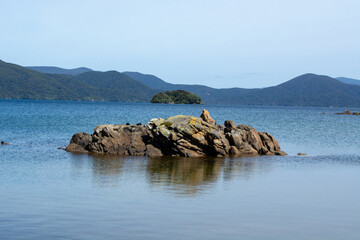 Serene Coastal Landscape with Rocky Outcrop
