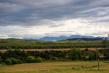 Scenic Landscape with Mountains and Green Hills