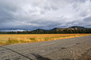 Scenic Rural Landscape with Road and Mountains