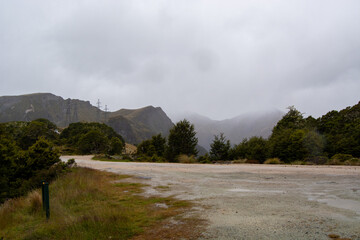 Misty Mountain Landscape with Gravel Road
