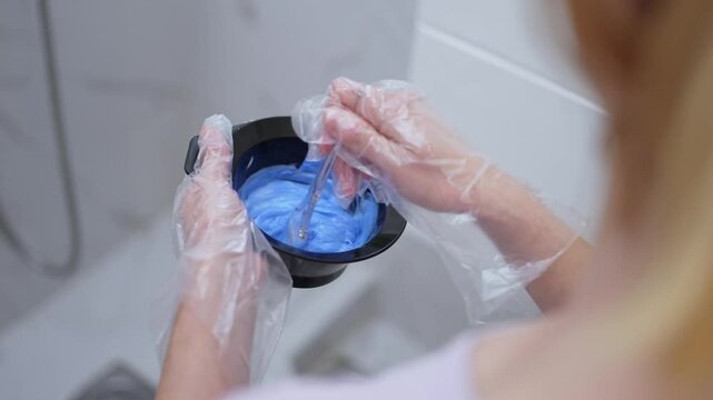 Mixing vibrant blue hair color for a bold transformation