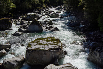 Scenic River Flowing Through Rocky Landscape