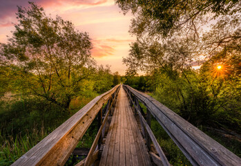 wooden bridge over the river