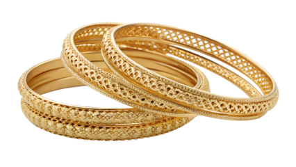 A stack of intricately designed gold bangles, isolated on a transparent background