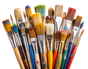 composition of mixed artist paint brushes coated with bright, thick acrylic