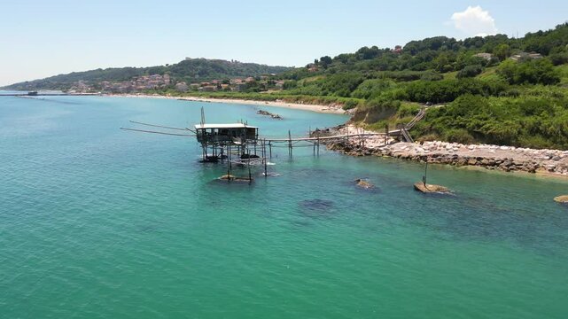 Italy, 11 July 2025: Aerial drone view of the trabocchi, ancient fishing machines on stilts, located on the Trabocchi coast near San Vito Chietino in the Province of Chieti Abruzzo 
