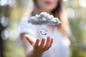 Conceptual cloud computing illustration with a woman holding a digital cloud