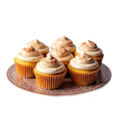 Six Yellow Cupcakes with Creamy Frosting on a Decorative Plate