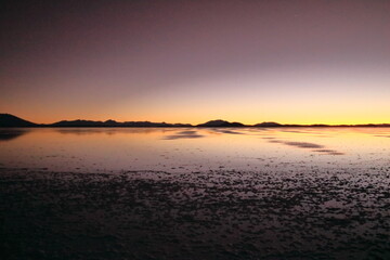 Sunset over the Salar de Uyuni, the world's largest salt flat, Bolivia