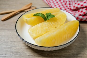 Fresh Pineapple in white plate