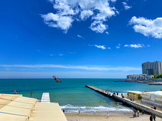 It is pleasant to walk along the breakwater on a sunny weekend day without risking freezing in the still cold spring water.