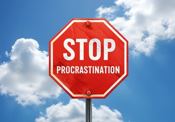 Obraz premium Red stop sign on blue sky with clouds