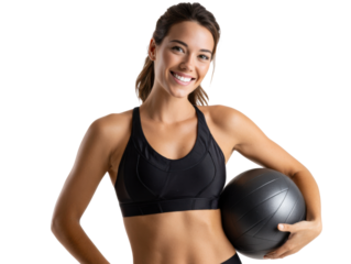 Energetic woman in gym: A vibrant woman poses gracefully with a fitness ball, embodying vitality and wellness. She emanates joy and well-being, highlighting a fitness-focused and healthy lifestyle. 