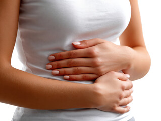 Health Concerns: A person clutches their abdomen, conveying a sense of discomfort and concern. The image encapsulates the complexities of healthcare.