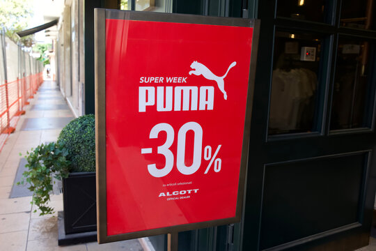 Messina, Italy - June 28, 2025: Puma promotional sign advertising Super Week sale with 30% discount outside Alcott store in urban shopping area